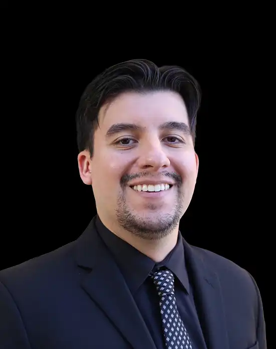 Professional studio portrait of male associate attorney in dark suit and tie
